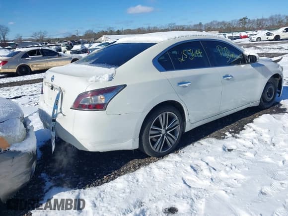 ✅ 2013 Nissan Maxima S • VIN: 1N4AA5AP0DC821281 • Lot: 41380825. Listed on IAAI with 82,693 mi. Free auction sales archive from the USA and detailed vehicle history report at DreamBid. Image 4.