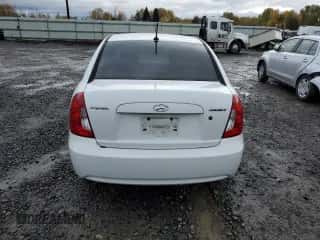 2011 Hyundai Accent GLS z VIN KMHCN4ACXBU608548, wystawiony jako Copart lot #79972454 z przebiegiem 176 612 mil mil oraz Czysty tytuł • Clean title. Historia ofert i sprzedaży dostępna na DreamBid. Obrazek 6.