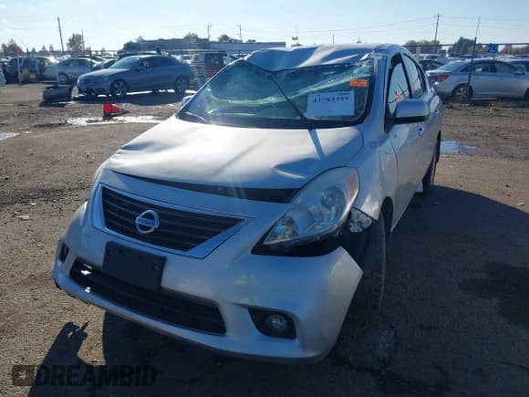 ✅ 2012 Nissan Versa SV • VIN: 3N1CN7AP6CL910233 • Lot: 43783339. Listed on IAAI with Not provided. Free auction sales archive from the USA and detailed vehicle history report at DreamBid. Image 2.