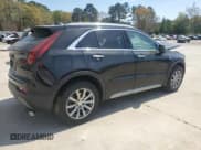 ✅ 2021 Cadillac XT4 FWD Premium Luxury • VIN: 1GYFZCR48MF002468 • Lot: 50878955. Listed on Copart with 76,034 mi. Free auction sales archive from the USA and detailed vehicle history report at DreamBid. Image 3.