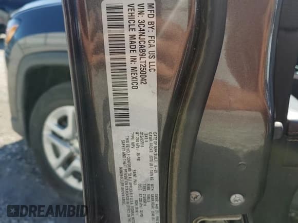 ✅ 2020 Jeep Compass Sport • VIN: 3C4NJCAB9LT250042 • Lot: 63656165. Listed on Copart with 131,635 mi. Free auction sales archive from the USA and detailed vehicle history report at DreamBid. Image 12.