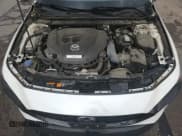 ✅ 2021 Mazda 3 Premium Plus • VIN: JM1BPBNY1M1334729 • Лот: 83754925. Опубликован ранее на Copart с пробегом 60 196 миль. Бесплатный доступ к архиву аукционных продаж из США и подробный отчёт об истории автомобиля на DreamBid. Изображение 16.