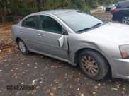 ✅ 2011 Mitsubishi Galant FE • VIN: 4A32B2FF1BE018648 • Lot: 43450337. Listed on IAAI with 103,795 mi. Free auction sales archive from the USA and detailed vehicle history report at DreamBid. Image 6.