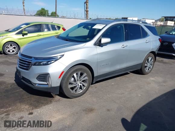 2022 Chevrolet Equinox Premier with VIN 3GNAXNEV8NS152892, listed as a IAAI auction lot 42799811 with 33,818 mi miles and . Bid and sale history available at DreamBid. Image 2.