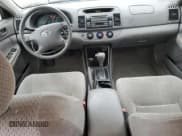 ✅ 2002 Toyota Camry LE • VIN: JTDBE32K220136952 • Лот: 93010485. Опубликован ранее на Copart с пробегом 214 216 миль. Бесплатный доступ к архиву аукционных продаж из США и подробный отчёт об истории автомобиля на DreamBid. Изображение 8.