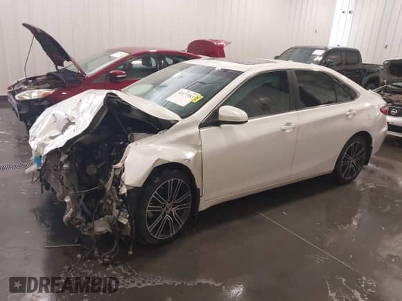 2016 Toyota Camry SE with VIN 4T1BF1FK7GU510141, listed as a IAAI auction lot 42377583 with 118,153 mi miles and . Bid and sale history available at DreamBid. Image 2.