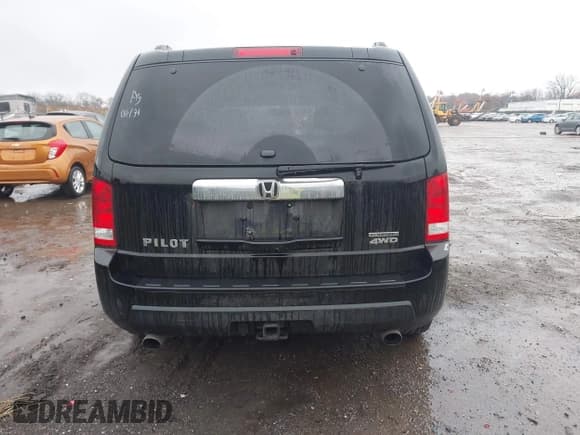 ✅ 2010 Honda Pilot Touring • VIN: 5FNYF4H92AB005361 • Lot: 43778618. Listed on IAAI with 243,937 mi. Free auction sales archive from the USA and detailed vehicle history report at DreamBid. Image 16.