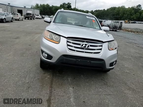 ✅ 2011 Hyundai Santa Fe Limited • VIN: 5XYZK3AB6BG090500 • Lot: 70398164. Listed on Copart with 188,910 mi. Free auction sales archive from the USA and detailed vehicle history report at DreamBid. Image 11.