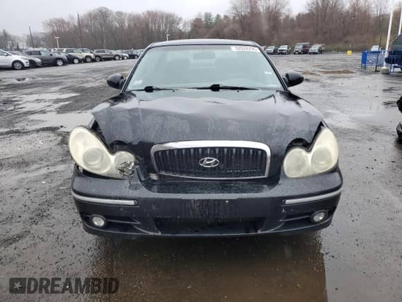 2003 Hyundai Sonata GLS z VIN KMHWF35H93A889433, wystawiony jako Copart lot #52028295 z przebiegiem 159 566 mil mil oraz Szkoda całkowita • Salvage title. Historia ofert i sprzedaży dostępna na DreamBid. Obrazek 5.