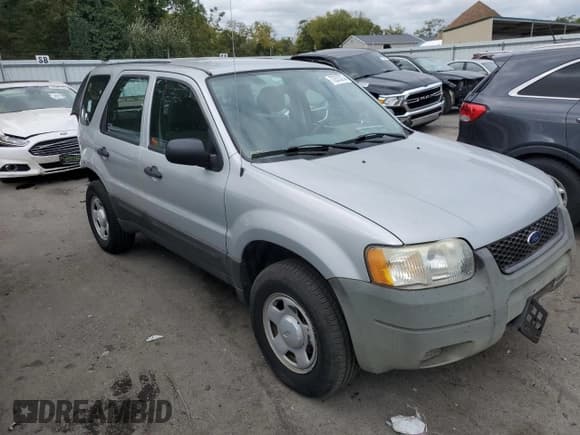 ✅ 2003 Ford Escape XLS Popular • VIN: 1FMYU92133KC03843 • Lot: 72575774. Listed on Copart with 95,963 mi. Free auction sales archive from the USA and detailed vehicle history report at DreamBid. Image 4.