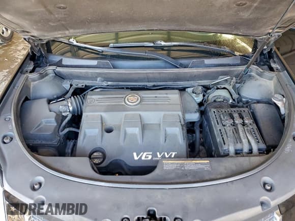 ✅ 2012 Cadillac SRX Performance Collection • VIN: 3GYFNEE39CS659777 • Lot: 94455295. Listed on Copart with 181,120 mi. Free auction sales archive from the USA and detailed vehicle history report at DreamBid. Image 12.