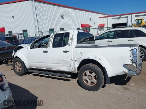 ✅ 2005 Nissan Frontier LE • VIN: 1N6AD07U05C424881 • Lot: 43605829. Listed on IAAI with 199,731 mi. Free auction sales archive from the USA and detailed vehicle history report at DreamBid. Image 15.