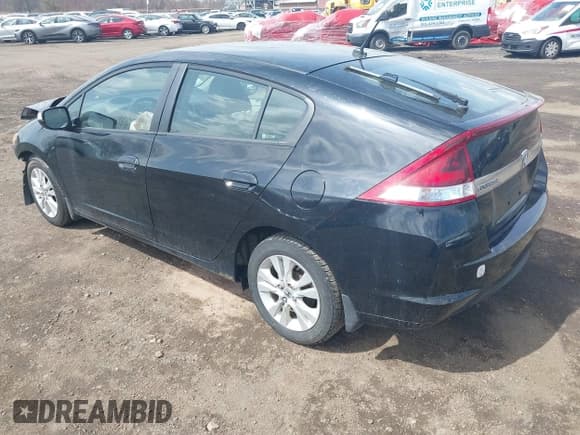 ✅ 2012 Honda Insight EX • VIN: JHMZE2H72CS000160 • Lot: 41909694. Listed on IAAI with 106,312 mi. Free auction sales archive from the USA and detailed vehicle history report at DreamBid. Image 3.