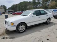 ✅ 1997 Mercedes-Benz C 230/260/280/320 • VIN: WDBHA28E6VA514172 • Лот: 54156745. Опубликован ранее на Copart с пробегом 157 074 миль. Бесплатный доступ к архиву аукционных продаж из США и подробный отчёт об истории автомобиля на DreamBid. Изображение 1.