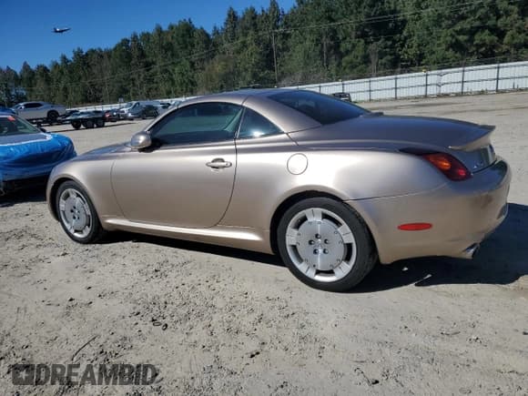✅ 2004 Lexus SC 430 • VIN: JTHFN48Y740059838 • Lot: 87066795. Listed on Copart with 165,334 mi. Free auction sales archive from the USA and detailed vehicle history report at DreamBid. Image 2.