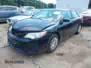 2012 Toyota Camry XLE with VIN 4T1BD1FK4CU035970, listed as a IAAI auction lot 42685356 with 170,567 mi miles and . Bid and sale history available at DreamBid. Image 2.