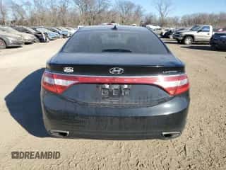 2014 Hyundai Azera Limited z VIN KMHFH4JG1EA410812, wystawiony jako Copart lot #83031084 z przebiegiem 147 615 mil mil oraz Szkoda całkowita • Salvage title. Historia ofert i sprzedaży dostępna na DreamBid. Obrazek 6.