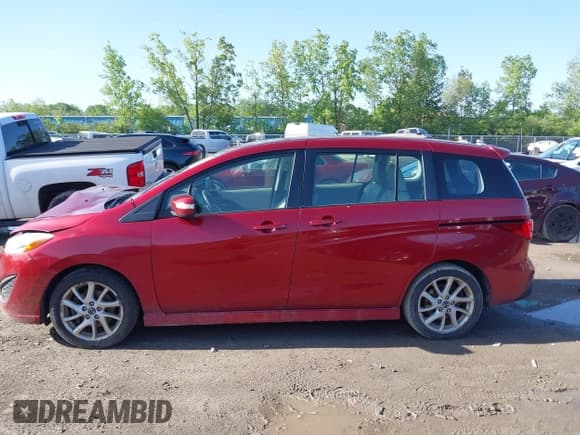 ✅ 2013 Mazda 5 Grand Touring • VIN: JM1CW2DLXD0160971 • Лот: 42284854. Опубликован ранее на IAAI с пробегом 137 756 миль. Бесплатный доступ к архиву аукционных продаж из США и подробный отчёт об истории автомобиля на DreamBid. Изображение 14.