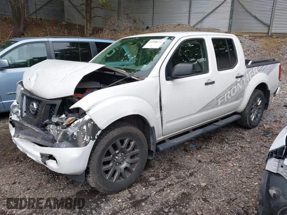 ✅ 2012 Nissan Frontier Pro-4X • VIN: 1N6AD0EV7CC409206 • Lot: 42388170. Listed on IAAI with 126,411 mi. Free auction sales archive from the USA and detailed vehicle history report at DreamBid. Image 17.