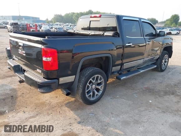 ✅ 2015 GMC Sierra 1500 SLT • VIN: 3GTU2VEC7FG406907 • Lot: 42921399. Listed on IAAI with 96,075 mi. Free auction sales archive from the USA and detailed vehicle history report at DreamBid. Image 4.