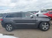 ✅ 2014 Jeep Grand Cherokee Overland • VIN: 1C4RJFCG6EC211600 • Lot: 43289489. Listed on IAAI with 133,935 mi. Free auction sales archive from the USA and detailed vehicle history report at DreamBid. Image 14.