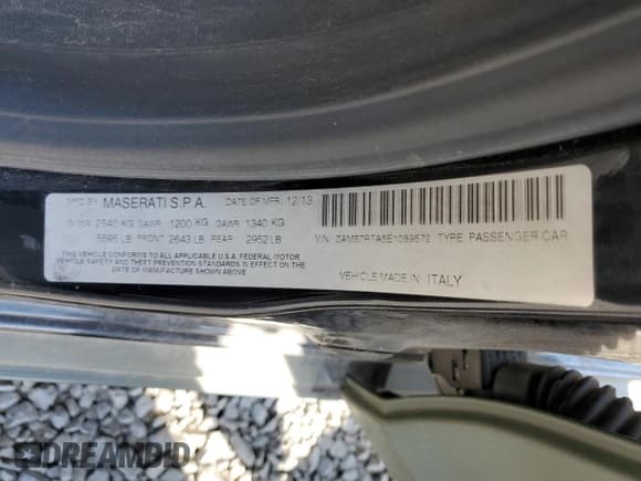 ✅ 2014 Maserati Ghibli S Q4 • VIN: ZAM57RTA5E1089572 • Lot: 69994085. Listed on Copart with Not provided. Free auction sales archive from the USA and detailed vehicle history report at DreamBid. Image 13.