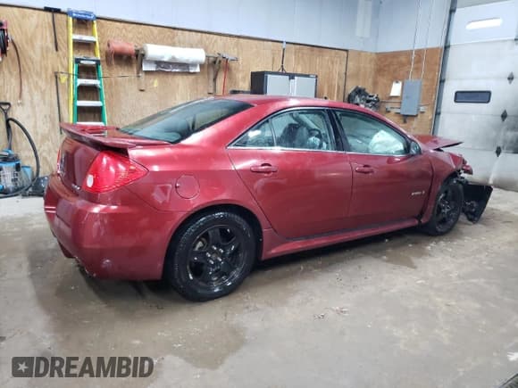 ✅ 2009 Pontiac G6 GXP 1SA • VIN: 1G2ZM577394178197 • Лот: 77670094. Опубликован ранее на Copart с пробегом 188 493 миль. Бесплатный доступ к архиву аукционных продаж из США и подробный отчёт об истории автомобиля на DreamBid. Изображение 3.