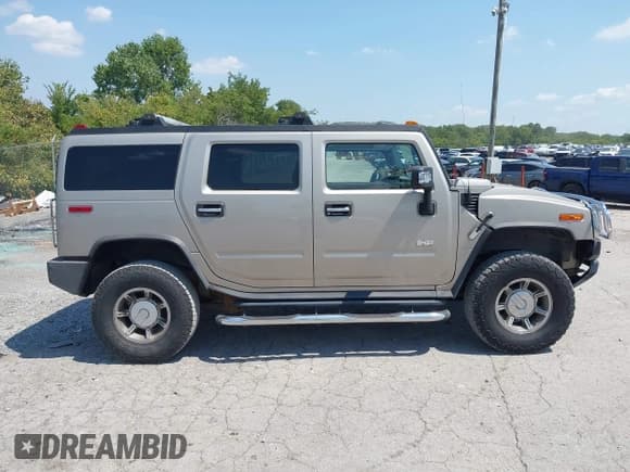 ✅ 2005 Hummer H2 SUV • VIN: 5GRGN23U05H102013 • Lot: 43035915. Wystawiony na IAAI z przebiegiem 148 850 mil. Bezpłatny archiwum sprzedaży aukcyjnych z USA i szczegółowy raport historii pojazdu na DreamBid. Zdjęcie 13.