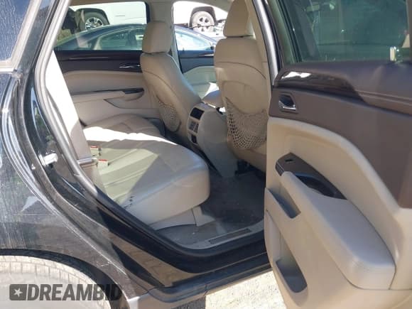 ✅ 2016 Cadillac SRX Luxury Collection • VIN: 3GYFNBE32GS529067 • Lot: 43380586. Listed on IAAI with 116,435 mi. Free auction sales archive from the USA and detailed vehicle history report at DreamBid. Image 8.