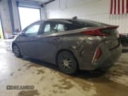 ✅ 2021 Toyota Prius XLE • VIN: JTDKAMFP6M3174970 • Lot: 85478855. Listed on Copart with 69,387 mi. Free auction sales archive from the USA and detailed vehicle history report at DreamBid. Image 2.