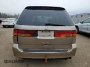 ✅ 2003 Honda Odyssey EX • VIN: 2HKRL18613H013103 • Lot: 90668365. Wystawiony na Copart z przebiegiem 301 152 mil. Bezpłatny archiwum sprzedaży aukcyjnych z USA i szczegółowy raport historii pojazdu na DreamBid. Zdjęcie 6.