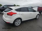 ✅ 2017 Ford Focus Titanium • VIN: 1FADP3N23HL244301 • Lot: 56625555. Listed on Copart with 96,304 mi. Free auction sales archive from the USA and detailed vehicle history report at DreamBid. Image 3.