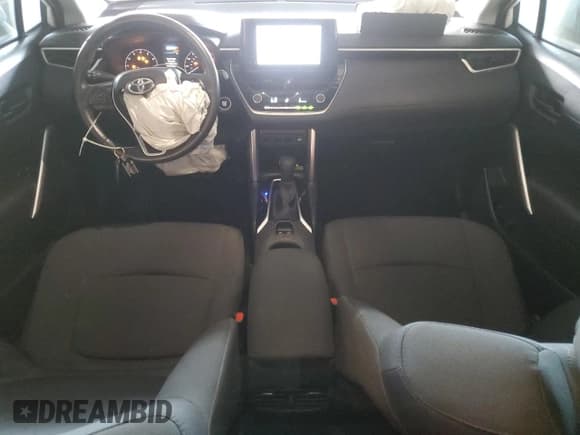 ✅ 2023 Toyota Corolla Cross LE • VIN: 7MUBAAAG8PV071516 • Lot: 87414505. Wystawiony na Copart z przebiegiem 35 598 mil. Bezpłatny archiwum sprzedaży aukcyjnych z USA i szczegółowy raport historii pojazdu na DreamBid. Zdjęcie 8.