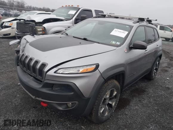 ✅ 2014 Jeep Cherokee Trailhawk • VIN: 1C4PJMBSXEW156973 • Lot: 43760581. Wystawiony na IAAI z przebiegiem 2 021 071 mil. Bezpłatny archiwum sprzedaży aukcyjnych z USA i szczegółowy raport historii pojazdu na DreamBid. Zdjęcie 17.
