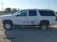 2012 Chevrolet Suburban LT z VIN 1GNSKJE74CR256132, wystawiony jako IAAI lot #43120737 z przebiegiem 195 627 mil mil oraz . Historia ofert i sprzedaży dostępna na DreamBid. Obrazek 14.