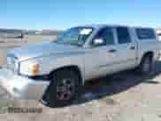 2006 Dodge Dakota SLT with VIN 1D7HE48N46S556925, listed as a IAAI auction lot 41169757 with 158,667 mi miles and . Bid and sale history available at DreamBid. Image 2.