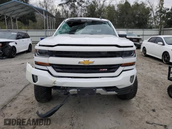 2018 Chevrolet Silverado 1500 LT с VIN 3GCUKREC1JG480341, выставлен на аукционе Copart как лот 84434194 с пробегом 95 932 миль миль и Списание • Salvage title. История ставок и продаж доступна на DreamBid. Изображение 5.