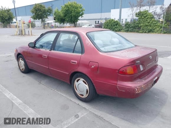 ✅ 2000 Toyota Corolla VE • VIN: 1NXBR18E5YZ351233 • Lot: 42648918. Listed on IAAI with 202,723 mi. Free auction sales archive from the USA and detailed vehicle history report at DreamBid. Image 3.