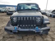✅ 2022 Jeep Wrangler Unlimited Sahara High Altitude • VIN: 1C4JJXP60NW214074 • Lot: 57163735. Listed on Copart with 25,858 mi. Free auction sales archive from the USA and detailed vehicle history report at DreamBid. Image 5.