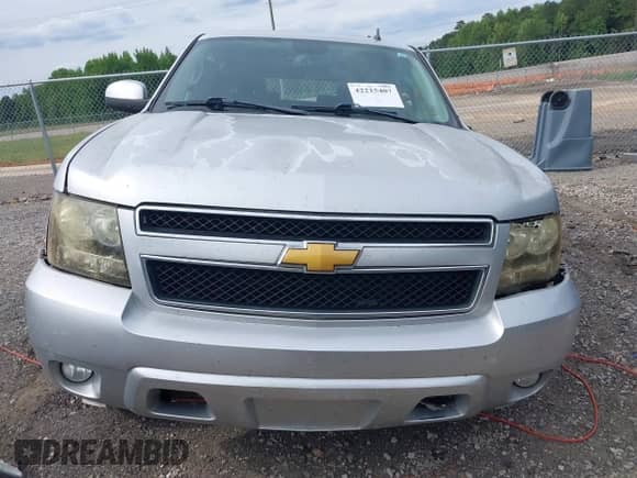 2014 Chevrolet Suburban LT z VIN 1GNSCJE0XER203597, wystawiony jako IAAI lot #42215407 z przebiegiem 186 556 mil mil oraz . Historia ofert i sprzedaży dostępna na DreamBid. Obrazek 13.