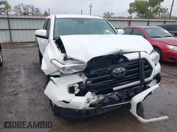 ✅ 2019 Toyota Tacoma SR • VIN: 5TFCZ5AN6KX185143 • Lot: 43552591. Listed on IAAI with 71,741 mi. Free auction sales archive from the USA and detailed vehicle history report at DreamBid. Image 6.