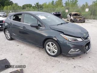 ✅ 2018 Chevrolet Cruze LT • VIN: 3G1BE6SM1JS596428 • Lot: 42985370. Listed on IAAI with 70,184 mi. Free auction sales archive from the USA and detailed vehicle history report at DreamBid. Image 1.