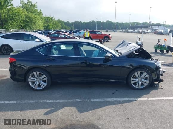 ✅ 2021 Acura TLX Technology • VIN: 19UUB5F4XMA014296 • Lot: 42688273. Listed on IAAI with Not provided. Free auction sales archive from the USA and detailed vehicle history report at DreamBid. Image 13.