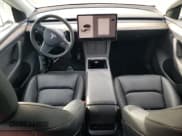 ✅ 2023 Tesla Model Y Long Range • VIN: 7SAYGDEE1PF827997 • Лот: 90992585. Опубликован ранее на Copart с пробегом 32 162 миль. Бесплатный доступ к архиву аукционных продаж из США и подробный отчёт об истории автомобиля на DreamBid. Изображение 8.