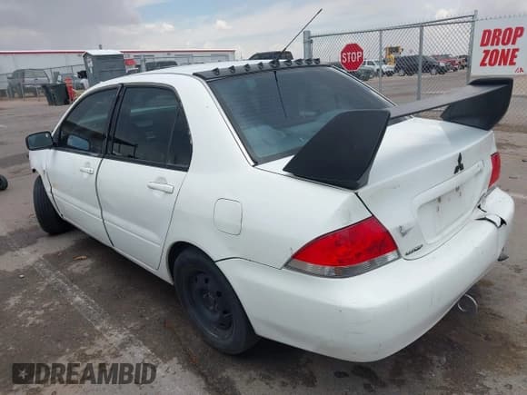 ✅ 2004 Mitsubishi Lancer ES • VIN: JA3AJ26E24U010333 • Lot: 42712708. Listed on IAAI with 249,376 mi. Free auction sales archive from the USA and detailed vehicle history report at DreamBid. Image 15.