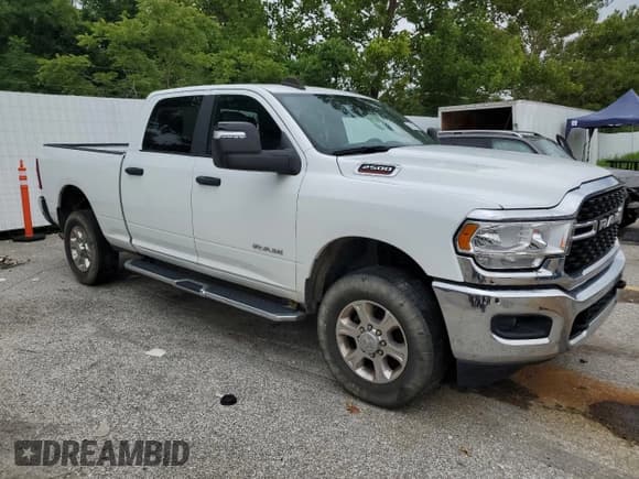 ✅ 2023 Ram 2500 Big Horn • VIN: 3C6UR5DJ7PG611048 • Lot: 67042465. Listed on Copart with 61,834 mi. Free auction sales archive from the USA and detailed vehicle history report at DreamBid. Image 4.
