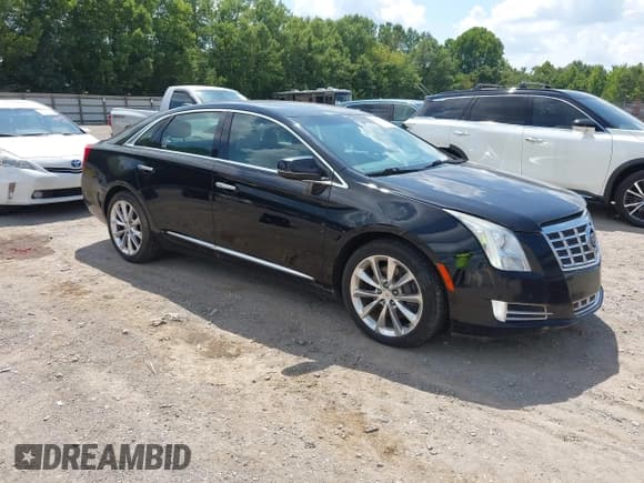 ✅ 2014 Cadillac XTS Luxury • VIN: 2G61N5S31E9120223 • Lot: 42921662. Wystawiony na IAAI z przebiegiem 216 899 mil. Bezpłatny archiwum sprzedaży aukcyjnych z USA i szczegółowy raport historii pojazdu na DreamBid. Zdjęcie 1.