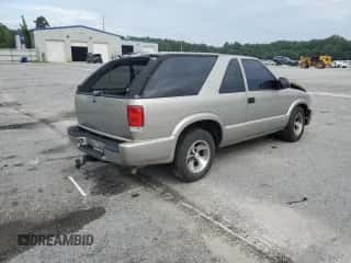 2004 Chevrolet Blazer LS z VIN 1GNCS18X74K157511, wystawiony jako Copart lot #65042754 z przebiegiem Nie podano mil oraz Nie do naprawy • Non repairable. Historia ofert i sprzedaży dostępna na DreamBid. Obrazek 3.