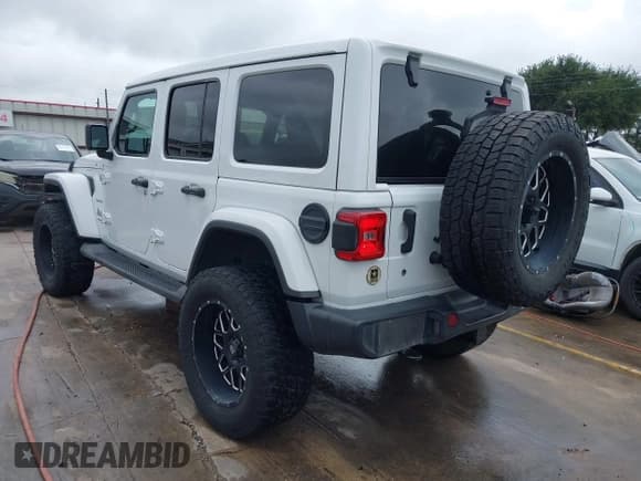 ✅ 2019 Jeep Wrangler Unlimited Sahara • VIN: 1C4HJXENXKW547676 • Lot: 42475926. Listed on IAAI with 130,952 mi. Free auction sales archive from the USA and detailed vehicle history report at DreamBid. Image 3.