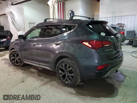 ✅ 2017 Hyundai Santa Fe Ultimate • VIN: 5XYZWDLAXHG448625 • Лот: 72946722. Опубликован ранее на Copart с пробегом 104 323 миль. Бесплатный доступ к архиву аукционных продаж из США и подробный отчёт об истории автомобиля на DreamBid. Изображение 2.